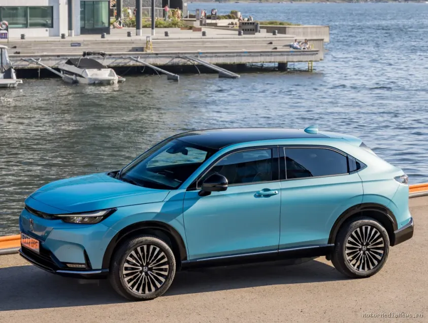 Боковая сторона Honda e:Ny1 202